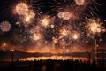 A stunning display of fireworks lighting up the sky over a body of water, Fireworks lighting up the midnight sky on New Year Royalty Free Stock Photo